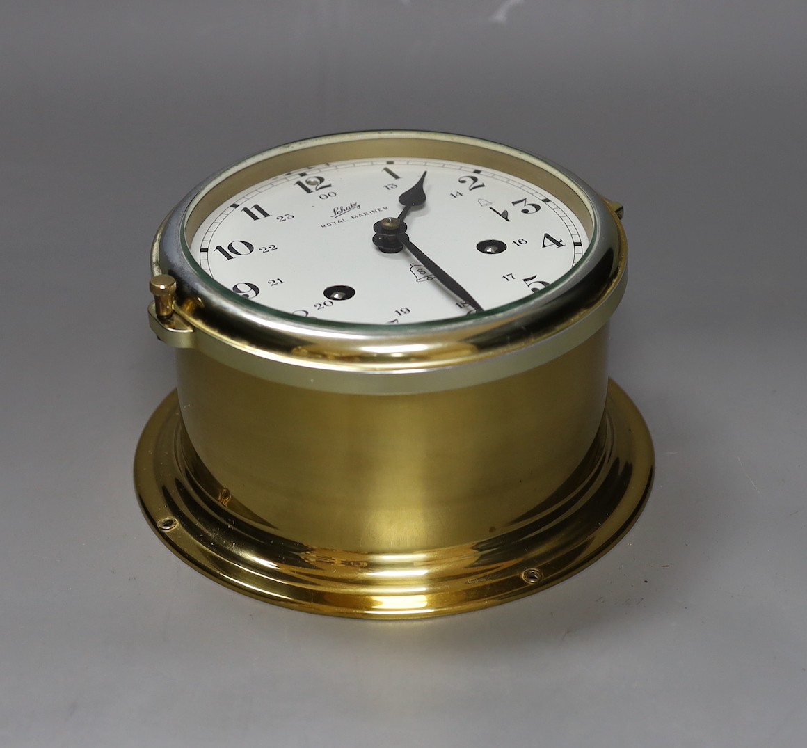 A Schatz Royal Mariner bulkhead clock, with key, 17 cms diameter